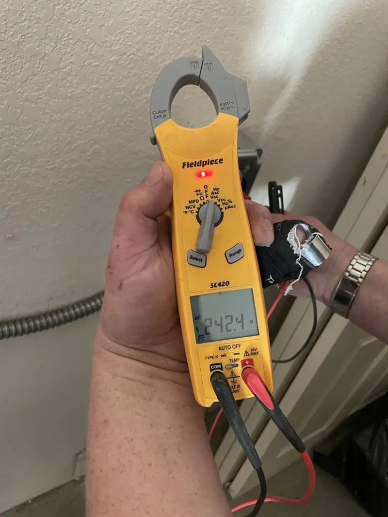 Voltage testing with clamp meter during Generator Installation in Puyallup